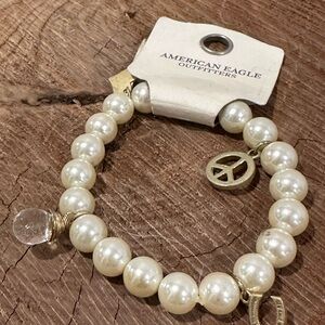 American Eagle Outfitters Gold and Pearl Charm Bracelet